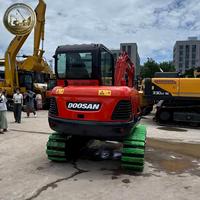 Excavatrice Doosan DX60-9C d'occasion 6T avec chenilles en caoutchouc, moteur d'origine, mini-excavatrice pour l'aménagement paysager et les travaux municipaux