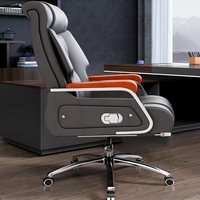 Chaise de bureau moderne minimaliste en cuir véritable, avec fonction massage et base en acier inclinable, confortable pour les longues heures de travail sur ordinateur à domicile