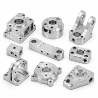 Composants de précision en alliage d'aluminium usinés CNC, tolérances de 0,005 mm, nickelés argent, usinage sur centre à quatre axes pour la robotique