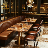 Ensemble de mobilier de luxe pour café et restaurant : table carrée en marbre marron, banquette en cuir et chaises