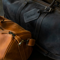 Sac polochon en cuir véritable de style vintage pour hommes et femmes, sac de voyage à bandoulière noble avec fermeture à glissière à motif géométrique