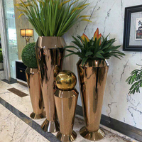 Pot de fleurs en acier moderne de luxe fait à la main, pot de fleurs d'intérieur en or rose, pot de fleurs en métal, décoration de jardin, vase de sol pour l'entrée