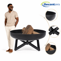 Brasero d'extérieur rond en fer avec foyer peu profond et support en X à quatre pieds, design moderne et minimaliste pour patio