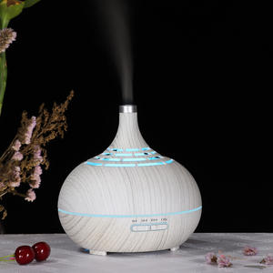 Difusor de Aroma Creativo con Diseño de Madera, Humidificador de 0.5L con Alimentación USB y Temporizador para Uso en el Hogar y la Oficina - Product Image 1