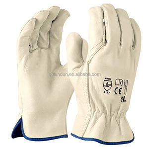 Guantes de trabajo de cuero de vaca de primera calidad personalizados Guantes de cuero duraderos para el trabajo Guantes DE SEGURIDAD DE CUERO ampliamente utilizados - Product Image 1