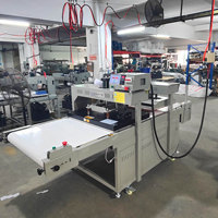 Machine de transfert thermique à ligne continue pour une production d'impression de vêtements et de t-shirts à haute efficacité