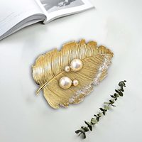 Statuette de luxe dorée en résine, motifs feuilles variés (Monstera, Lotus, Ginkgo), modèle de rangement pour décoration de table intérieure