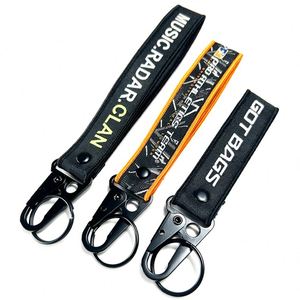 ป้ายทอแบบกำหนดเอง โลโก้สองด้าน สายคล้องคอรถยนต์ พวงกุญแจ สายผ้า JDM ปักลาย - Product Image 1