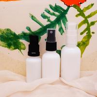 Bouteilles vides en verre de porcelaine blanche de 30ml 1Oz avec le chapeau d'or