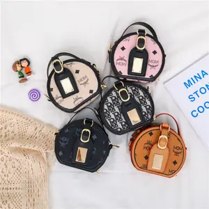 2024 al por mayor niños de lujo niños bolsos redondos bolso mini moneda marca famosa niñas niños diseñador monedero