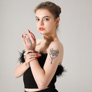 Autocollants de <span class=keywords><strong>tatouage</strong></span> temporaires jetables écologiques personnalisés OEM, <span class=keywords><strong>tatouage</strong></span> sexy pour le corps, le bras, le <span class=keywords><strong>henné</strong></span>, papier de décalcomanie, logo personnalisé, <span class=keywords><strong>homme</strong></span>, femme - Product Image 4