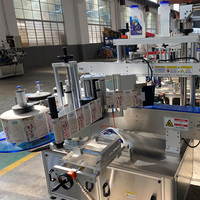 Machine d'étiquetage adhésive double face à grande vitesse pour bouteilles en plastique