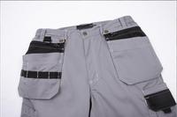 Pantalons de travail robustes en gros |   Pantalon de travail cargo renforcé avec plusieurs poches pour la construction, le charpentier et l'électricien