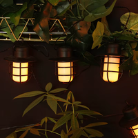 Ensemble de 10 guirlandes de lanterne à flamme scintillante solaire étanche pour l'extérieur vintage noir IP65 décoration de jardin en plastique