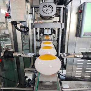 Applicateur de manchons haute précision avec tunnel thermique pour système de rétraction à température réglable pour bouteilles, canettes et contenants - Product Image 5