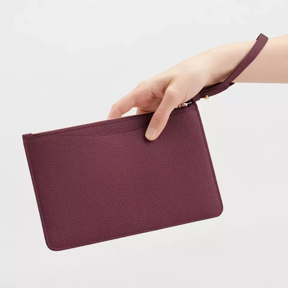 Tedarik fabrika özel hakiki deri el çantası çanta erkek ve kadın çantası toptan tasarımcı deri debriyaj cüzdan