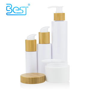 Eco friendly cosmetic packaging 30ml 50ml 100ml white plastic bamboo serum pump bottles and jar with bamboo top