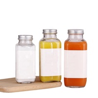 Vente en gros de bouteilles de boisson en verre transparentes créatives de 350 ml et 500 ml avec logo personnalisé, bouteille à jus et à thé réutilisable avec couvercle en aluminium