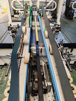 Machine à coller et à coudre les boîtes en carton, facile à utiliser pour l'emballage des bouteilles, des canettes, des films, des vêtements et des produits en papier
