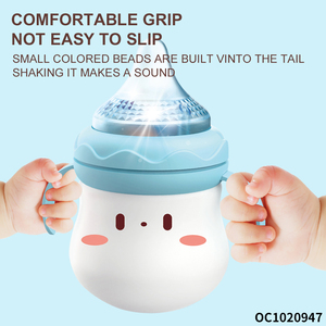 Hochet pour bébé en forme de biberon de dessin animé, jouet sensoriel Montessori électrique en plastique pour 0-6 et 6-12 mois avec lumières et musique - Product Image 5