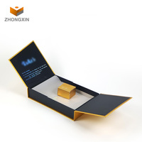 Boîte d'emballage en papier de luxe personnalisable en noir et or Boîtes cadeaux à double porte avec votre logo