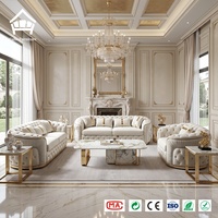 Canapé d'angle capitonné en cuir/velours blanc de luxe léger avec base plaquée or, solution d'ameublement complète pour la maison