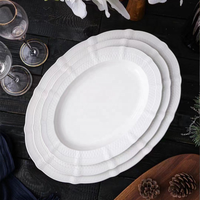 Nouvel ensemble d'assiettes de dîner ovales en céramique blanche gaufrée de style européen, assiette à poisson en porcelaine, plat à fruits de mer pour restaurant et banquet
