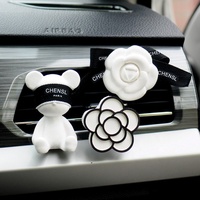 Diffuseur de parfum pour voiture Little Bear, design moderne en forme de fleur, à clipser sur la grille d'aération