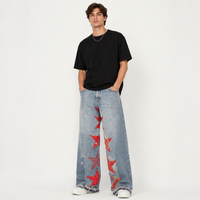 DiZNEW Jean patchwork bleu clair évasé avec 5 patchs étoile en PU texture croco, dégradé, taille blanche, surpiqûres contrastées, ourlet brut, personnalisable OEM