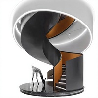 Escalier en colimaçon métallique de Hangzhou avec rampe en verre, personnalisé pour villa duplex, style simple et luxe léger, installation à l'entrée