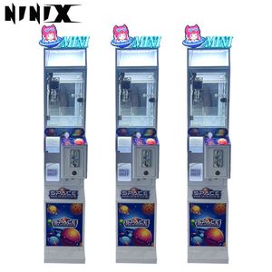 Máquina de garras recreativa para dulces, piruletas, juguetes pequeños y muñecas, para uso doméstico infantil, máquina expendedora de regalos, máquina de entretenimiento tipo arcade. Precios. - Product Image 6