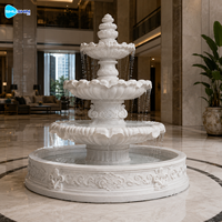 Fontaine en marbre de style chinois entièrement personnalisable avec motif de lotus pour jardin extérieur, solution de sculpture tout-en-un