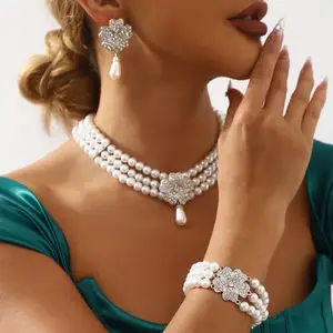 Modisches Kristallblume-Perle-Schmuckset für Damen-Halsband Armband Ohrring-Set Luxus-Hochzeit-Schmuckgeschenk