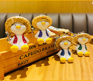 Wholesale Resin 3D Cartoon Happy Duck Keychain Cute Woven Straw Hat Duck Exquisite Accessories Bag Pendant Gift <b>Key</b> <b>Chain</b> - Product Image 2