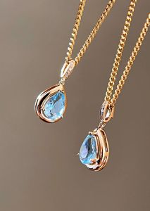 Pendentif pour femme Xinfly en or 18 carats avec pierre naturelle aigue-marine 0,55 carat en forme de goutte d'eau et diamant en forme de larme - Product Image 2