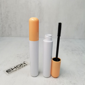 Vente en gros de contenants de mascara cylindriques brillants en ABS/PETG avec couvercle orange, tube à cils vide, emballage cosmétique personnalisé - Product Image 5