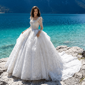 Vestido de Novia Princesa Jancember Gt26026 con Cuentas de Cristal, Lentejuelas, Escote Corazón, Manga Larga, Exquisito Diseño en Capas y Cola Real - Product Image 1