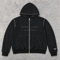 Sweat-shirt à capuche noir personnalisé pour homme avec fermeture éclair, motif géométrique en relief et passepoil contrastant – Fournisseur OEM/ODM