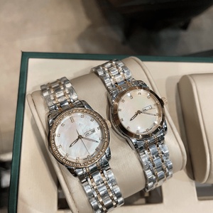 Montre de luxe haut de gamme avec mouvement à quartz précis, index des heures en diamant, cadran en nacre, lunette sertie de diamants, Longines. - Product Image 3