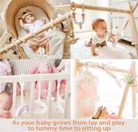 Portique d'éveil en bois pour bébé à prix abordable avec jouets suspendus