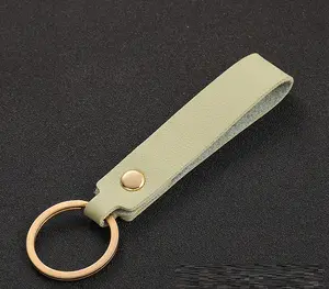 पीयू चमड़ा कार चाबी का गुच्छा चमड़ा लक्जरी पीयू कपड़ा बुनाई कार चाबी की चेन लटकन निर्माता थोक