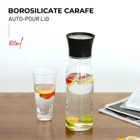 Carafe à eau en verre borosilicate avec couvercle à versement automatique, pichet à boisson à débit libre à 360 degrés, 800 ml, compatible réfrigérateur, décanteur à jus