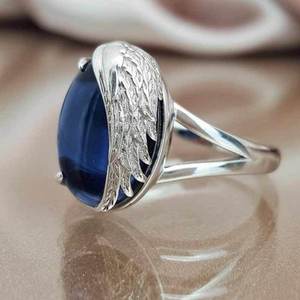 Anello creativo con ali d'angelo per donna, design con pietra blu intarsiata, gioielli eleganti e alla moda - Product Image 1
