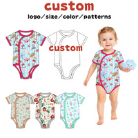 Korte mouw romper van bamboe, kimono-stijl, met drukknoopsluiting en contrastbies.