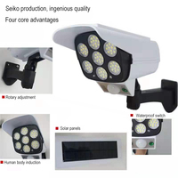 Lampe murale de sécurité extérieure étanche IP65 avec simulation de caméra de surveillance, 77 LED, détecteur de mouvement solaire, fausse caméra de surveillance