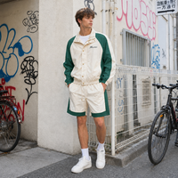 Ensemble de survêtement de tennis personnalisé OEM pour homme : veste zippée en nylon à col crème et short à cordon de serrage, tenue assortie, marque privée