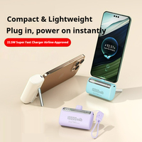 Batterie externe portable 10000mAh 18W 2-en-1 avec affichage numérique, cordon et support de câble USB-C pour recharge rapide de téléphone via interface Type-C