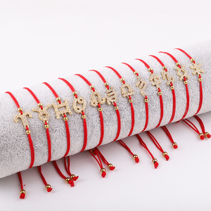 Nouveau Design Plaqué Or 18K Mignon Petit CZ Pave 12 Charme Du Zodiaque Cordon Rouge <span class=keywords><strong>Noeud</strong></span> Tissé Tressé Chanceux Amitié Bracelet JBS12667 - Product Image 1