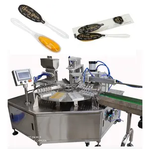 Auto rotary type spoon honey filling honey spoon filling packing machine machinery