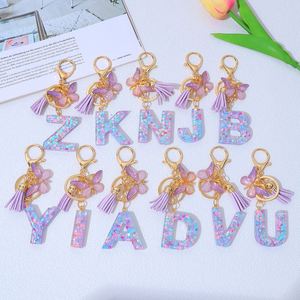 Nouveau porte-clés en résine avec pendentif papillon, lettres alphabet, paillettes de cristal AB et pompon pour femmes et filles - Product Image 4